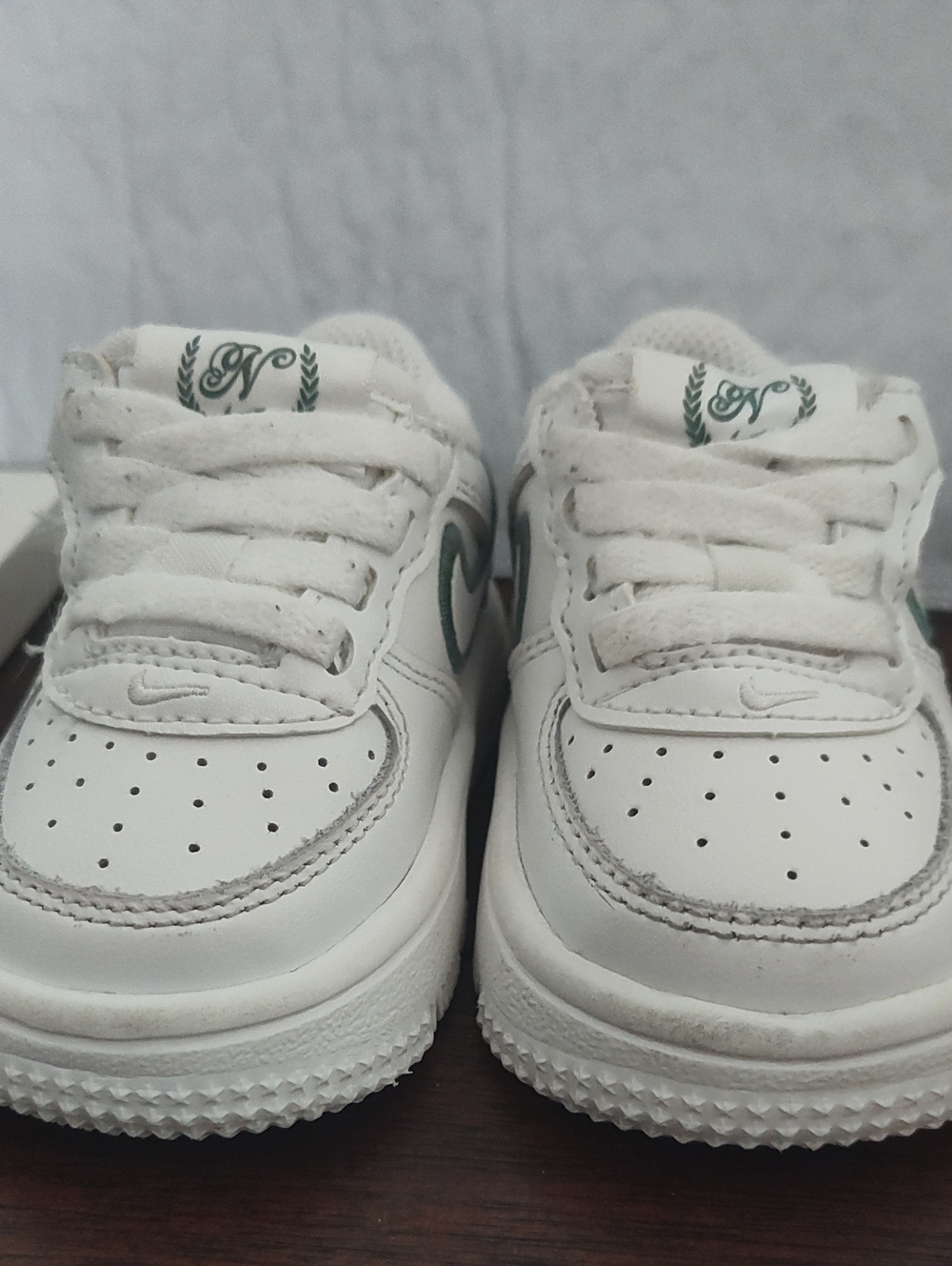 Nike Kids White Sneakers with Green Logo Accents
